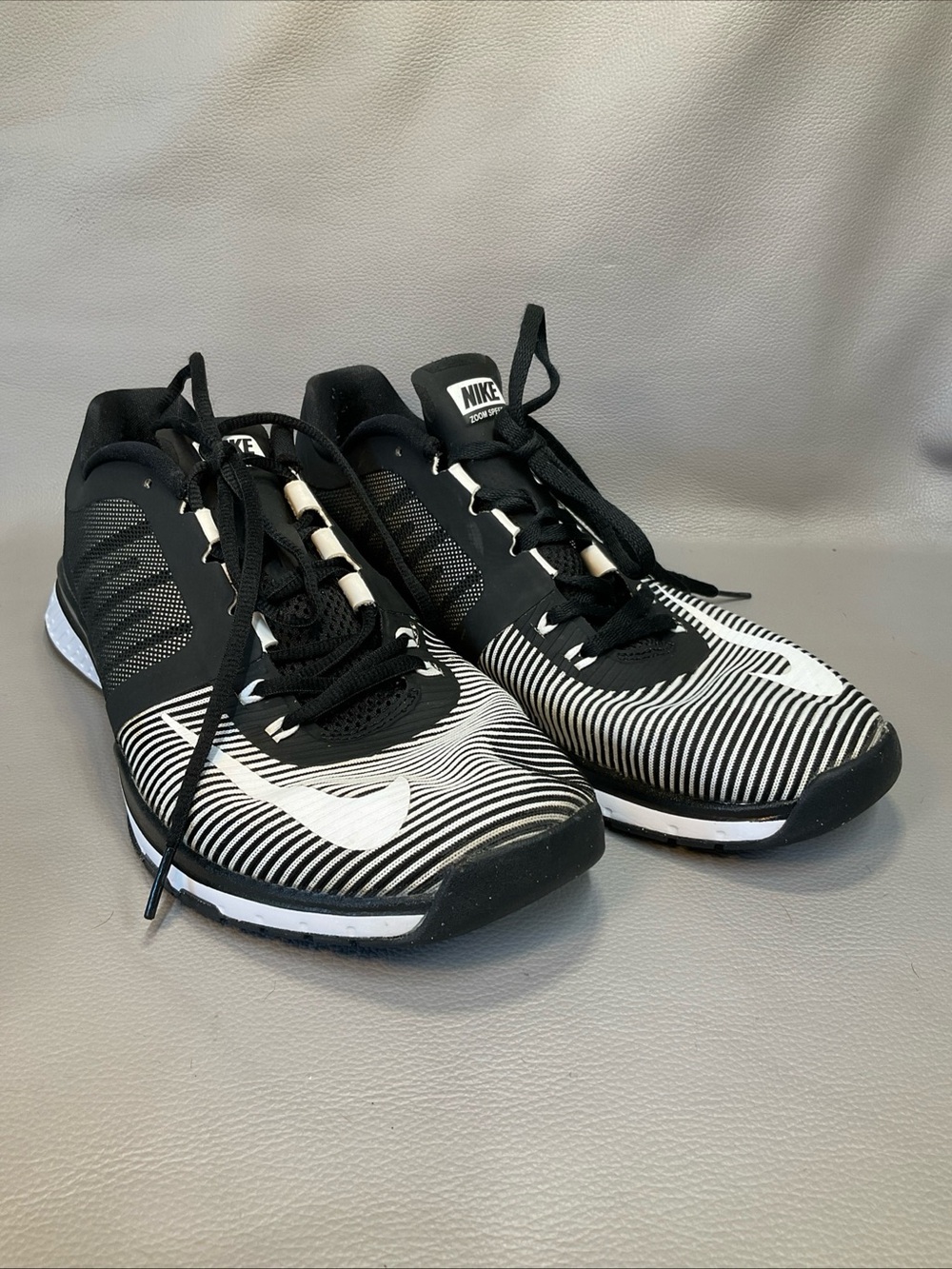 Nike Men’s Black and White Striped Sneakers